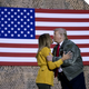 Illustration for article titled President Trump and Melania Visit Iraq, Smooch